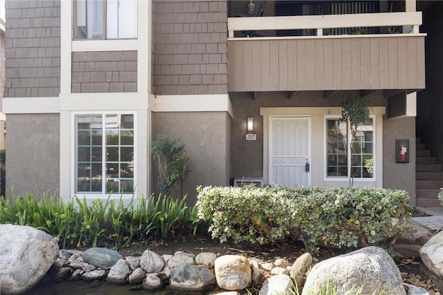 doorway to property with a balcony