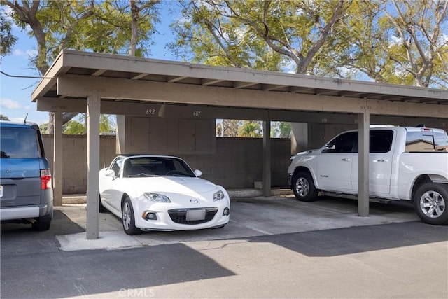 view of parking featuring a carport