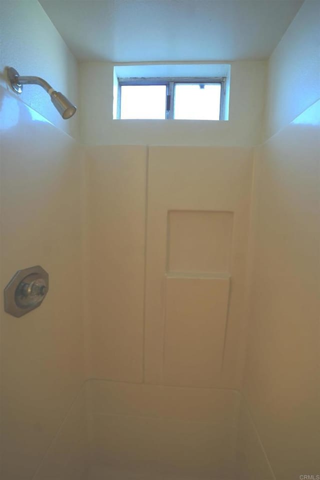 bathroom with a shower