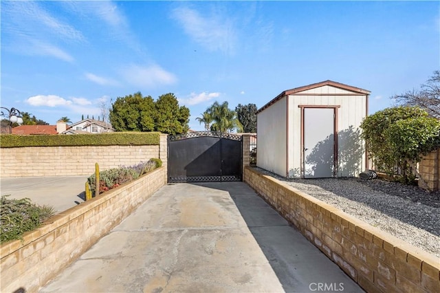 view of patio featuring a storage unit