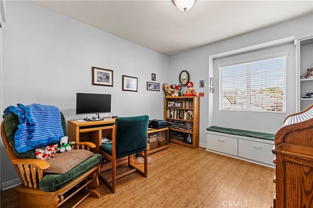 office area with light hardwood / wood-style flooring