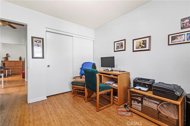 office featuring light hardwood / wood-style flooring and ceiling fan