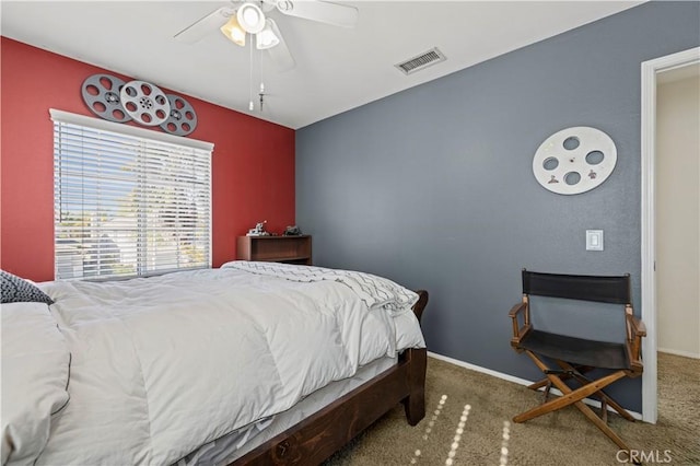 carpeted bedroom with ceiling fan