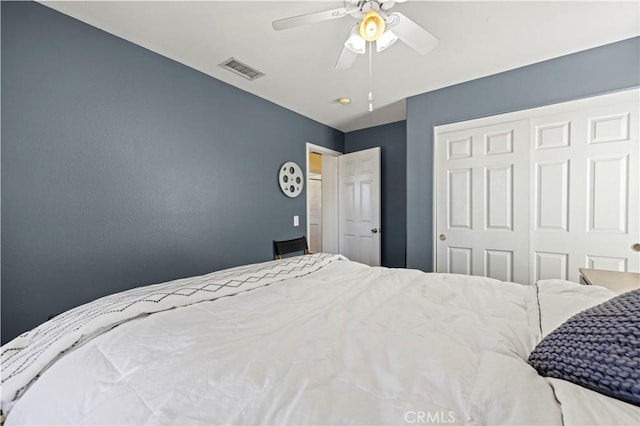 bedroom with a closet and ceiling fan