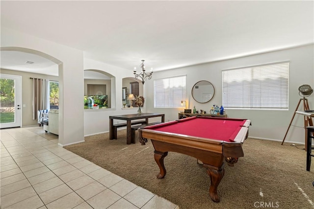 recreation room with light colored carpet