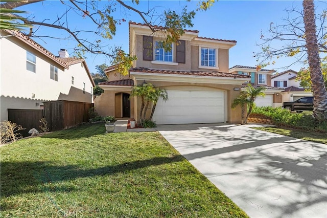 mediterranean / spanish home featuring a garage and a front lawn