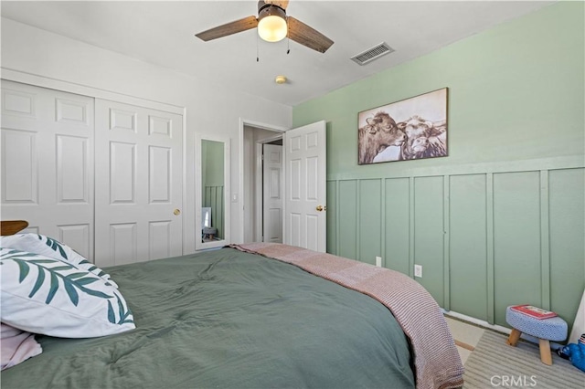 bedroom with a closet and ceiling fan