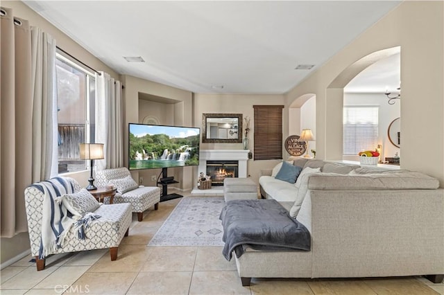 living room with light tile patterned floors