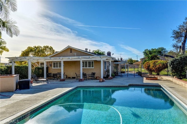 view of pool featuring a patio and a pergola