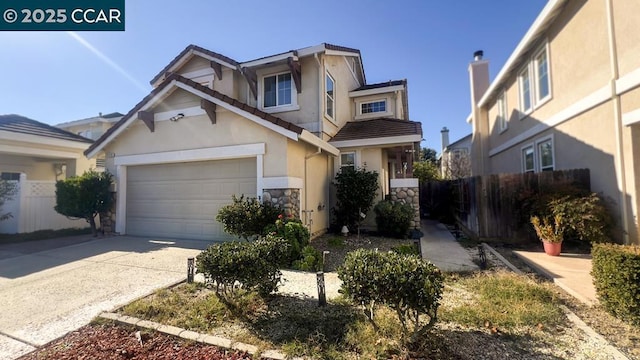 view of front of property with a garage