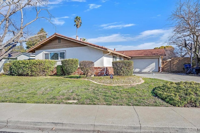 ranch-style home featuring a garage and a front yard