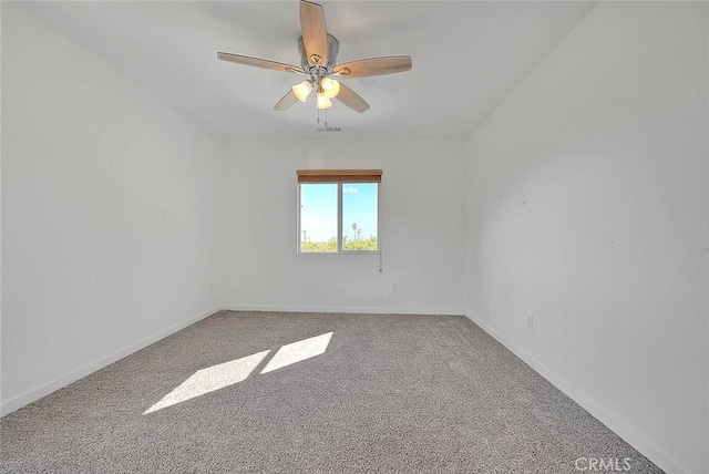 carpeted empty room with ceiling fan