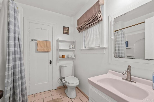 bathroom featuring sink, tile patterned floors, toilet, and a shower with shower curtain