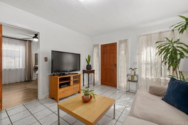 tiled living room with crown molding