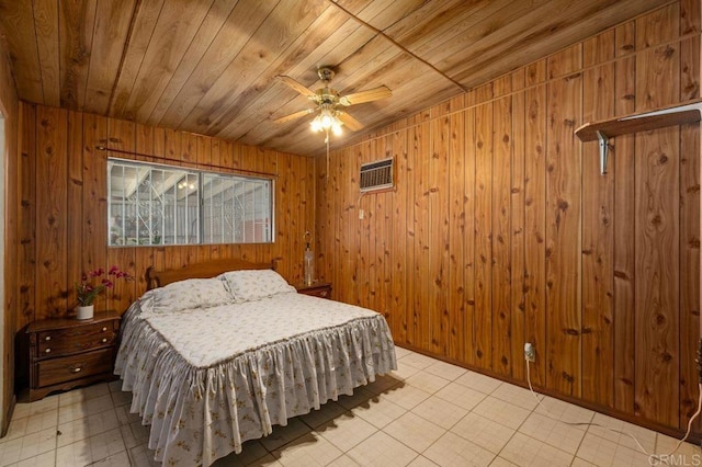 bedroom featuring a wall unit AC, wood ceiling, ceiling fan, and wood walls