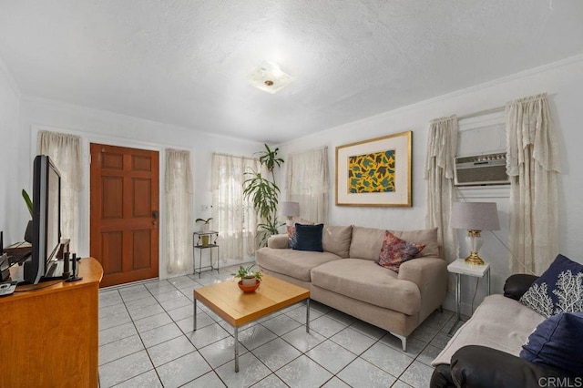 tiled living room featuring cooling unit, ornamental molding, and a textured ceiling