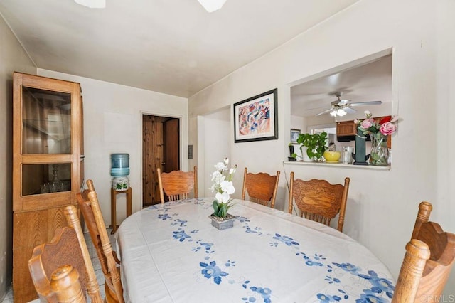 dining space with ceiling fan