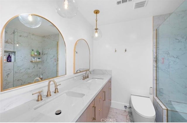 bathroom featuring walk in shower, vanity, and toilet