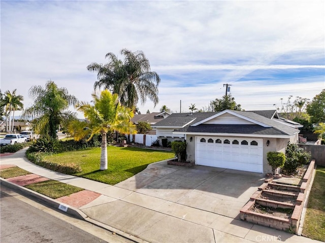 ranch-style home with a garage and a front yard