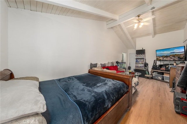 bedroom with hardwood / wood-style flooring, ceiling fan, lofted ceiling with beams, and wooden ceiling