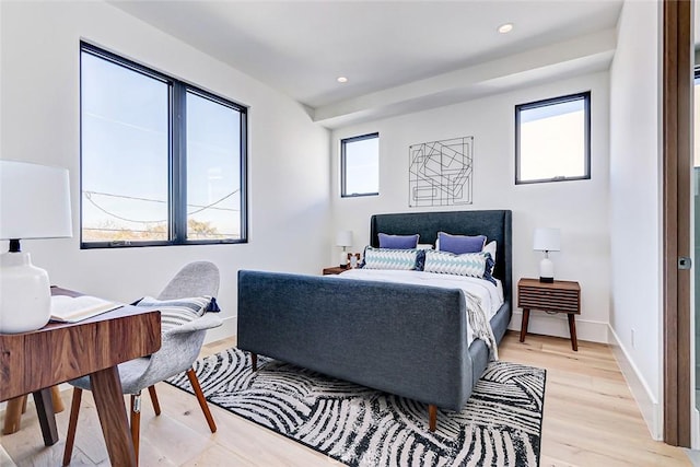 bedroom with light wood-type flooring