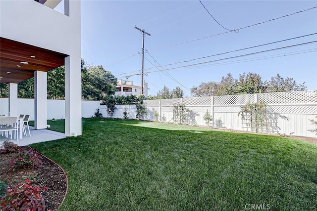 view of yard with a patio area