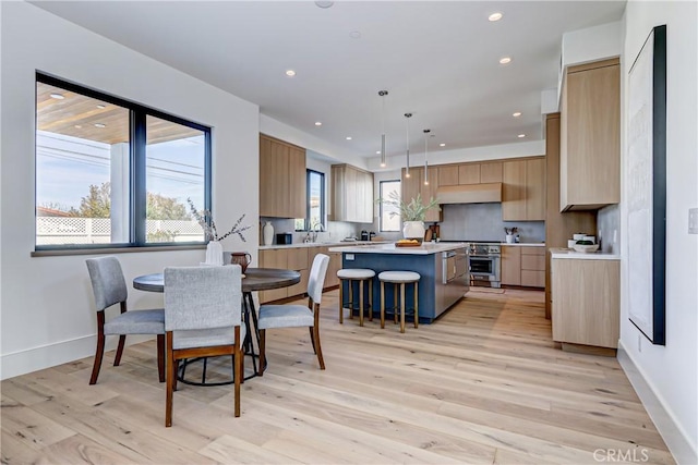 dining room featuring light wood-type flooring