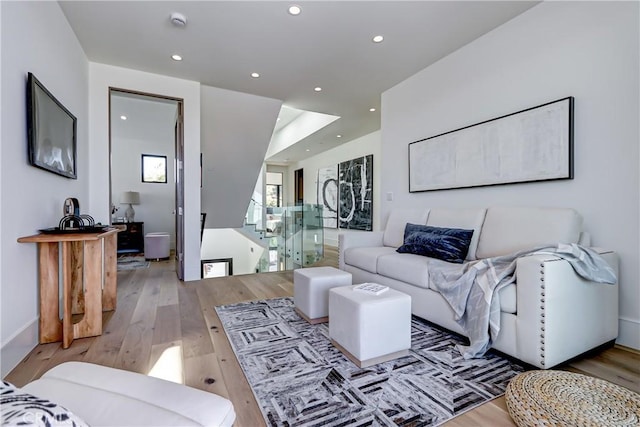 living room with light hardwood / wood-style floors