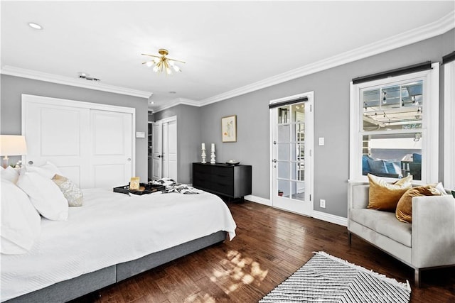 bedroom featuring dark wood-type flooring and crown molding