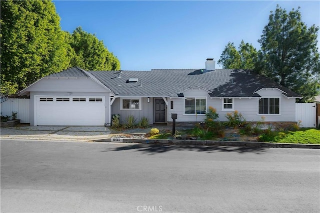 ranch-style home with a garage