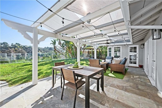 view of patio / terrace with an outdoor living space and a pergola