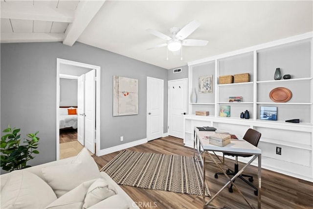 home office featuring wood-type flooring, vaulted ceiling with beams, and ceiling fan