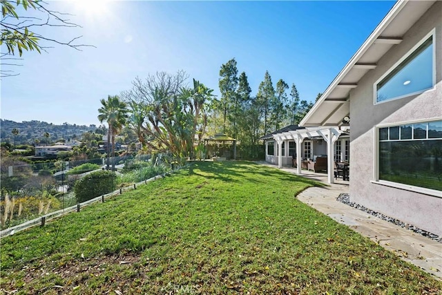 view of yard featuring a pergola and a patio area