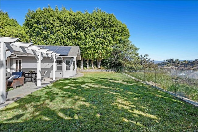 view of yard with a pergola and a patio area