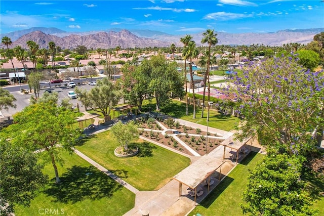 drone / aerial view featuring a residential view and a mountain view