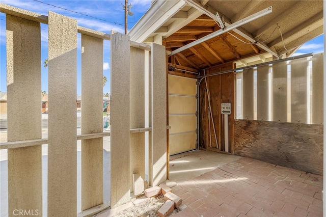 interior space with stucco siding