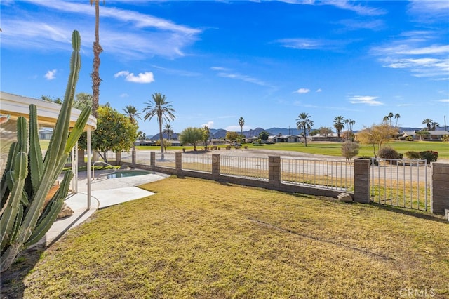 view of yard featuring a patio area and fence