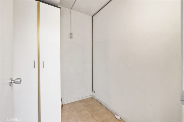 interior space with tile patterned floors