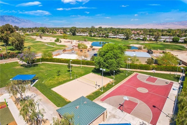 aerial view featuring a water view and golf course view