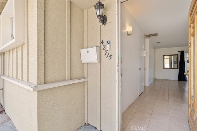 property entrance featuring visible vents