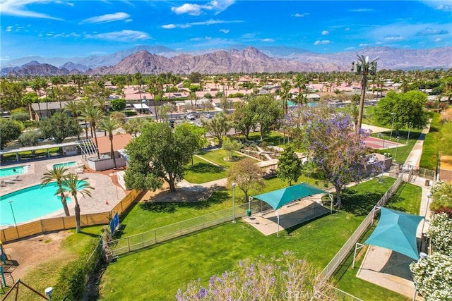 drone / aerial view with a residential view and a mountain view
