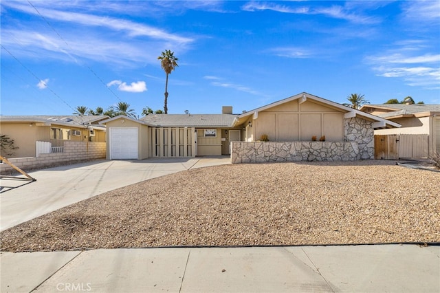 single story home featuring a garage