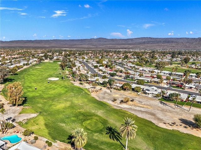 birds eye view of property featuring a mountain view and golf course view