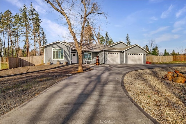 ranch-style house featuring a garage