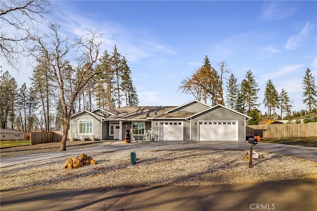 ranch-style home featuring a garage