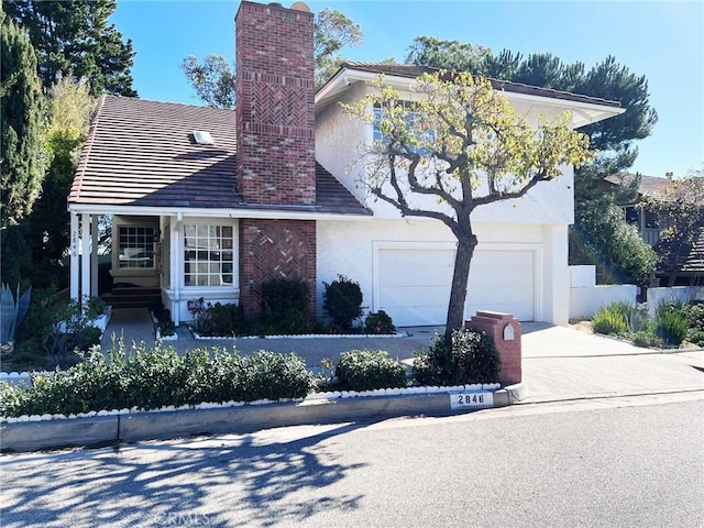 view of front of home with a garage