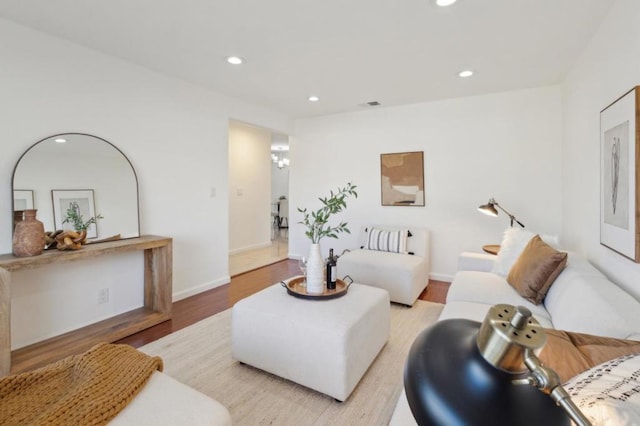 living room with light hardwood / wood-style floors