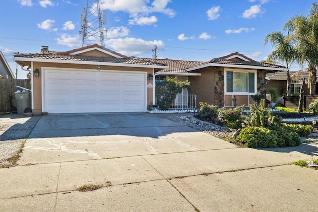 single story home with a garage