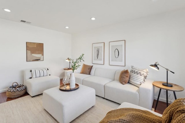 living room with light hardwood / wood-style floors