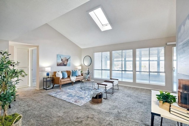 living room with high vaulted ceiling, a skylight, and carpet floors